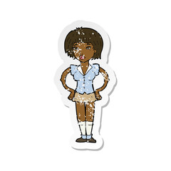 retro distressed sticker of a cartoon woman with hands on hips