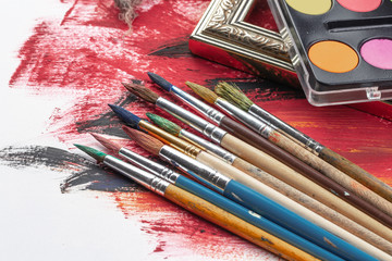 Obraz premium Paint brushes and paints for drawing.