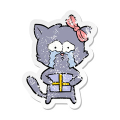 distressed sticker of a cartoon cat