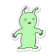sticker of a cartoon happy little alien