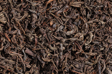 Dried tea leaves. Large leaf black tea.