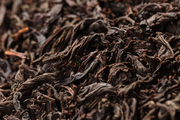 Dried tea leaves. Large leaf black tea.