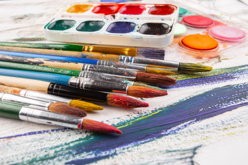 Obraz premium Paint brushes and paints for drawing.