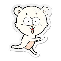 distressed sticker of a laughing teddy  bear cartoon