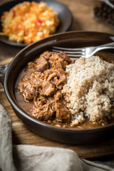 Barley groats with stewed meat.