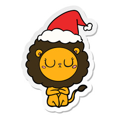 sticker cartoon of a lion wearing santa hat