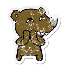 distressed sticker of a cartoon bear showing teeth