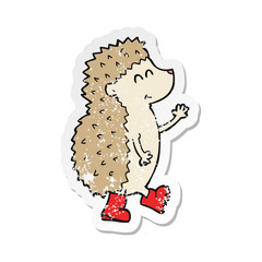 retro distressed sticker of a cute cartoon hedgehog
