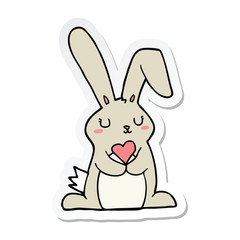 sticker of a cartoon rabbit in love