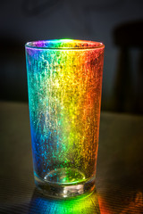 Top of tumbler glass receiving dispersed spectral light