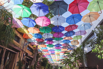 Fototapeta na wymiar Colorful umbrellas street decoration in Nicosia, Northern Cyprus.