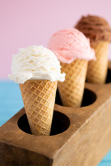 A Line of Three Classic Flavors of Ice Cream in a Wooden Sugar Mold