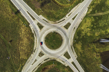 Aerial view of traffic circle roundabout road junction, top view