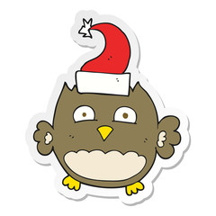 sticker of a cartoon owl wearing christmas hat