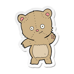 sticker of a cartoon teddy bear