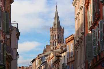 The most beautiful street of Toulouse - rue du Taur - with nice view on Saint Sernin Basilica's tower