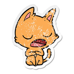 distressed sticker of a talking cat cartoon