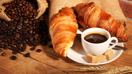 Coffee white cup and croissants