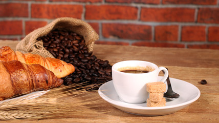 Coffee white cup and croissants