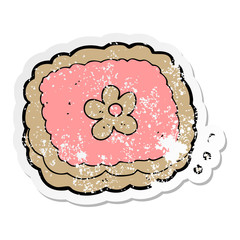 distressed sticker of a cartoon biscuit