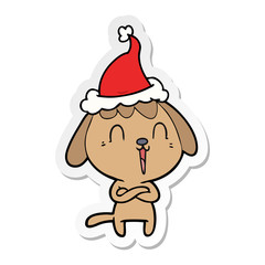 cute sticker cartoon of a dog wearing santa hat