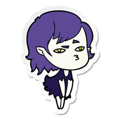 sticker of a cartoon vampire girl