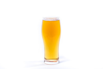 A glass of frothy bubbly beer isolated in white. 