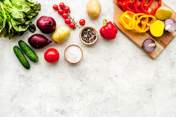 cooking with raw vegetables on light background top view mockup