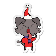 sticker cartoon of a panting dog wearing santa hat