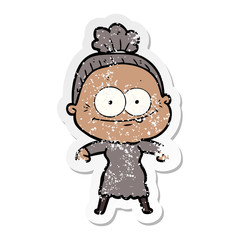 distressed sticker of a cartoon happy old woman