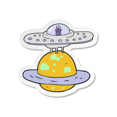 sticker of a cartoon flying saucer