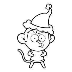 Obraz na płótnie Canvas line drawing of a surprised monkey wearing santa hat