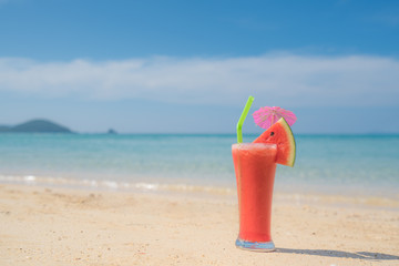 Watermelon cocktail on blue tropical summer beach in Phuket, Thailand. Summer, Vacation, Travel and Holiday concept.