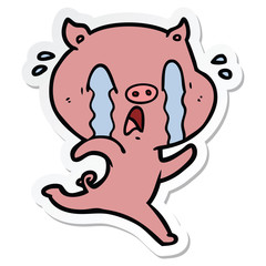 Obraz premium sticker of a crying pig cartoon