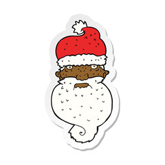 sticker of a cartoon grim santa face