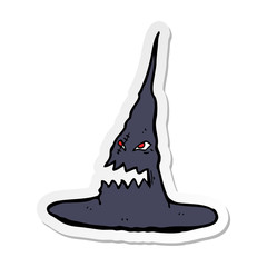 sticker of a cartoon spooky witches hat