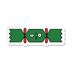 sticker of a cute cartoon christmas cracker