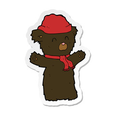 sticker of a cartoon cute black bear