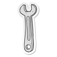 sticker of a cartoon spanner