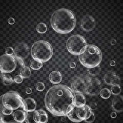 Realistic floating soap bubbles on transparent background. Design element for advertising booklet, flyer or poster