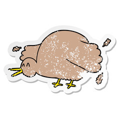 distressed sticker of a cartoon kiwi bird flapping wings