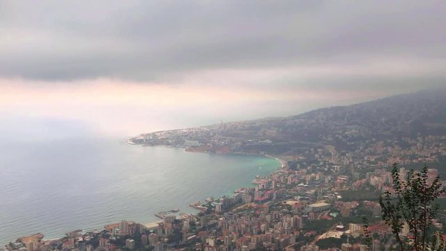Beautiful shot of Lebanon Landscape, city of Harisa with buildings, sea, trees & mountains