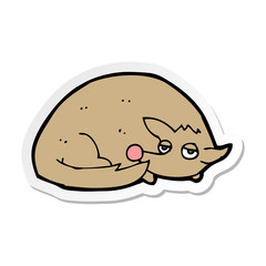 sticker of a cartoon curled up dog