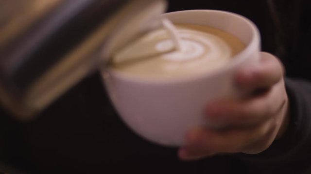 Barista Makes Latte Art Close Up