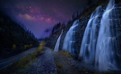Starry night , Milky Way Over Waterfall 