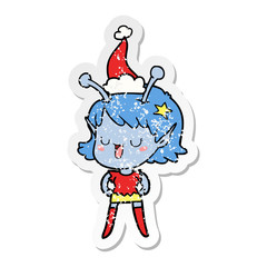 happy alien girl distressed sticker cartoon of a wearing santa hat