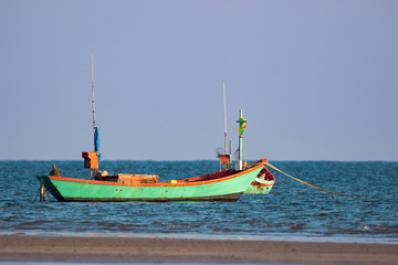 Fototapeta premium Image of small boat fishing on the sea.