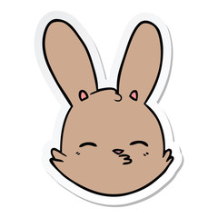 sticker of a cartoon bunny face considering
