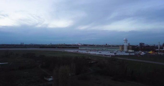 Aerial of the decommissioned Tempelhof Airport just before nightfall