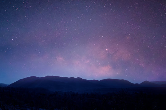 milky way,starry night landscape over mountion